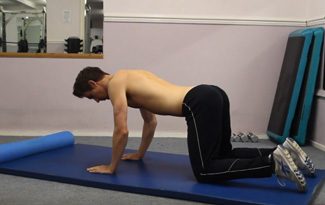 Graham Demonstrating the four point tummy vacuum