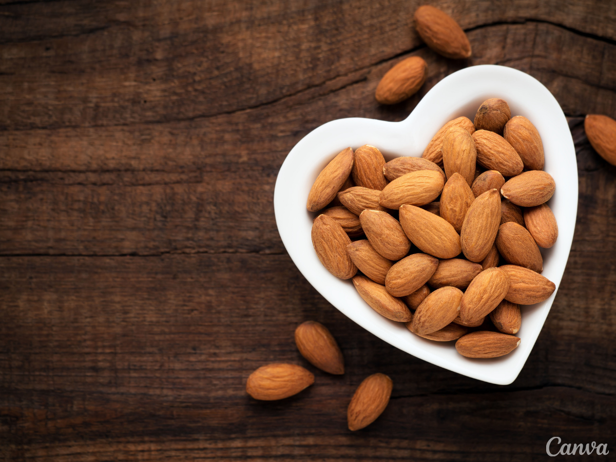 This image shows a bowl of almonds, which can be used in addition when creating homemade chocolate.